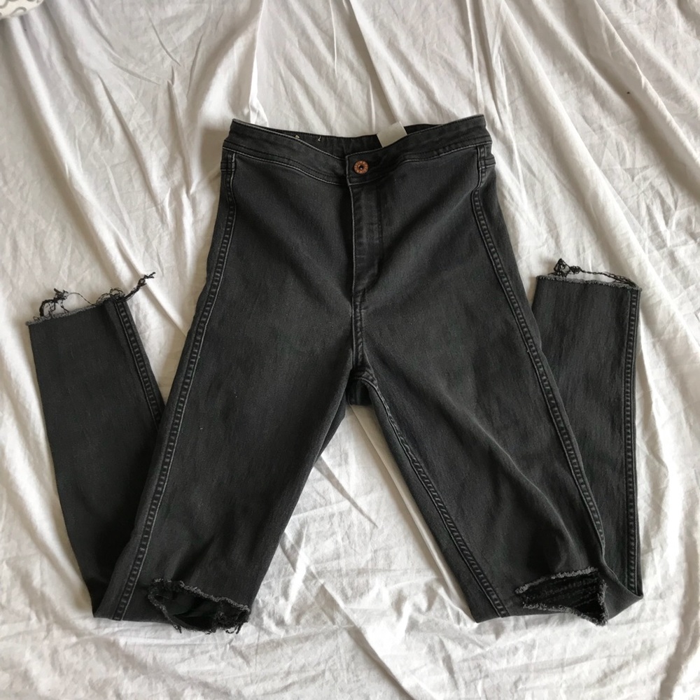 distressed skinny black jeggings